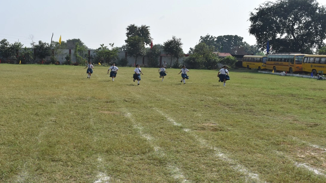 Students performing physics experiment